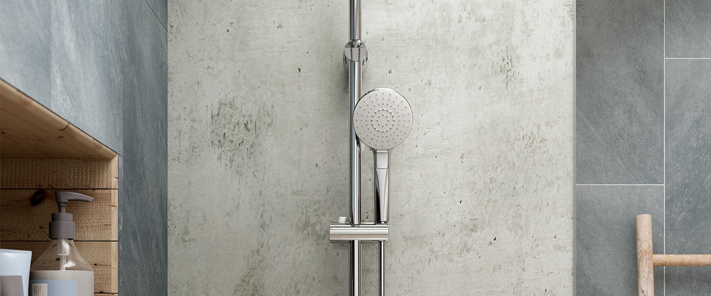 Photo de la collection Idealrain Evo mise en ambiance montrant un espace douche avec zoom sur la douchette