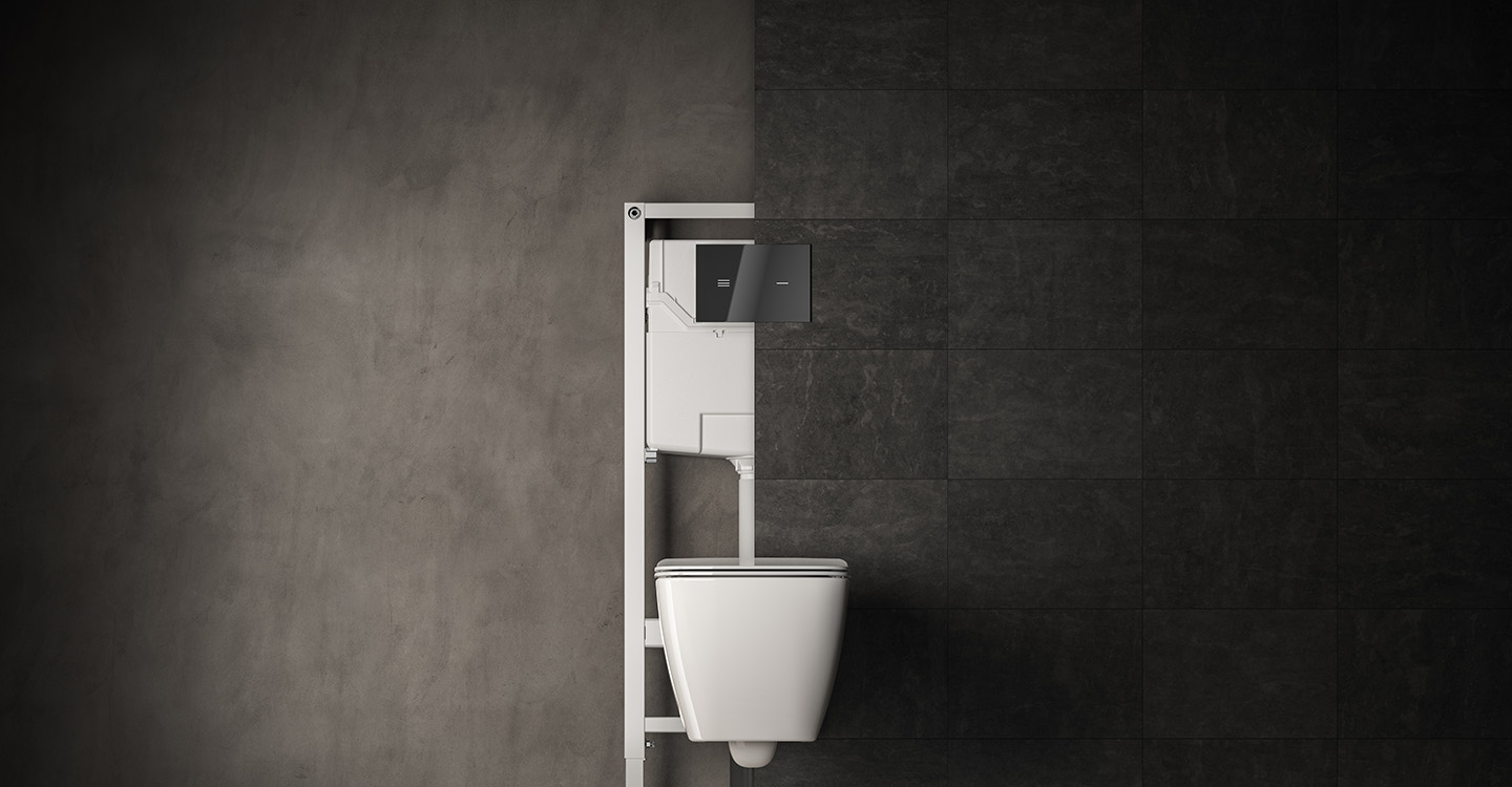 Photo de l'innovation ProSys représentant un bâti-support WC à la fois devant et derrière un mur carrelé gris foncé avec une cuvette suspendue blanche et une plaque de commande noire